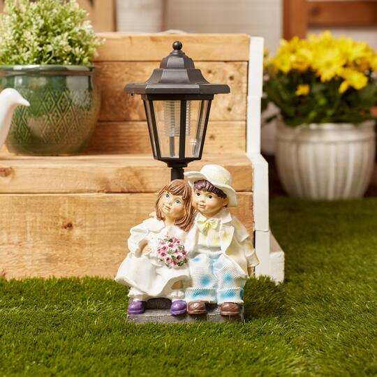 Couple with Solar Street Light Statue 8" x 6" x 12.75"